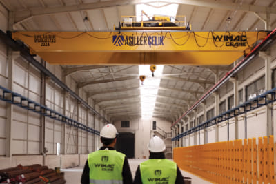 Puente grúa birraíl para líneas de producción